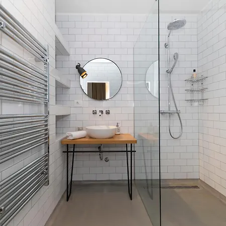 White By Belmont Realty Apartment